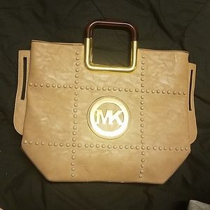 Imitation Michael Kors tan hand bag